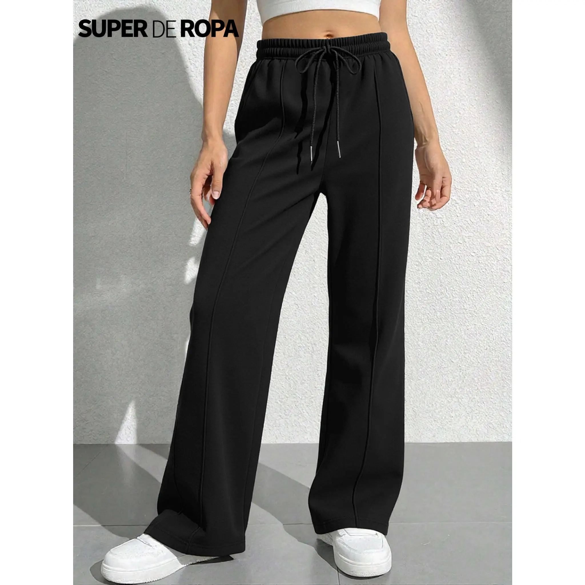 Super de ropa Pants Deportivo de Corte Recto, confeccionado en tela suave y ligera. Incluye cintura elástica con cordón para un ajuste perfecto y bolsos laterales, ideal para outfits urbanos o relajados.