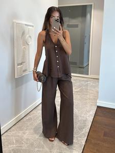 Conjunto casual de vacaciones para mujer: top corto sin mangas con cuello halter, escote en V y espalda descubierta con lazo atrás, combinado con pantalón de pierna ancha.