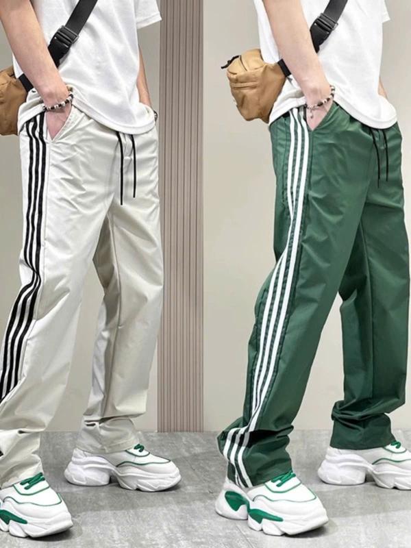 Quần gió nam ống suông Mềm Mịn Co Giãn hoạ tiết phối kẻ sọc phong cách thể thao 2025