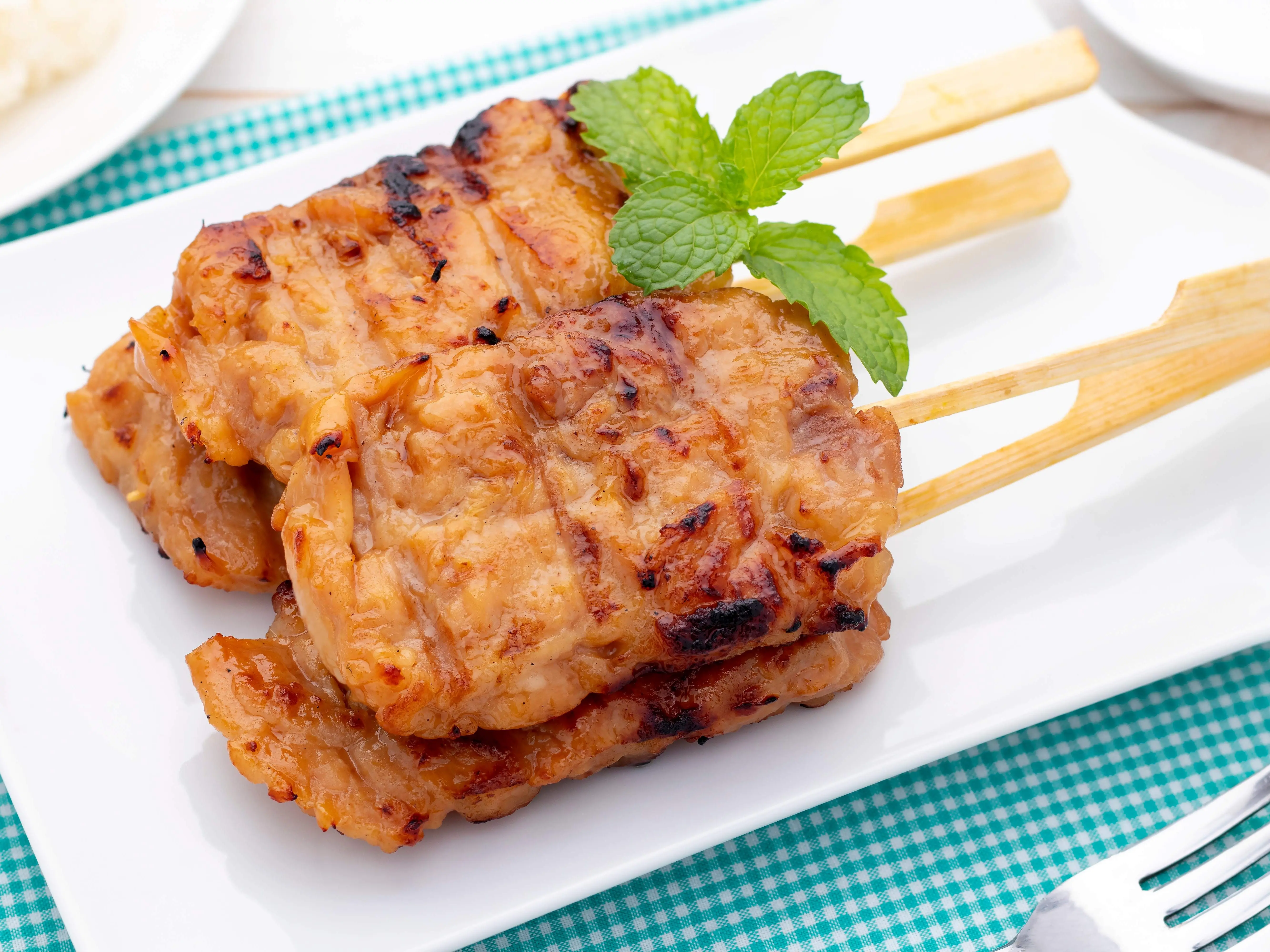 Moo Ping 10pc : offers you the delicious, smoky, and savory flavors of perfectly grilled pork skewers anytime, anywhere. Food Salt