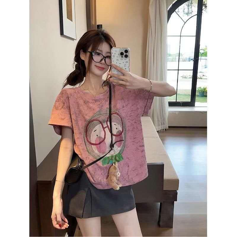 Áo thun nữ sọc ngang chất liệu cotton dáng rộng, in hình hoạt hình nhiều màu…