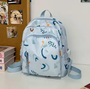 NGETOP - Tas Ransel Wanita MOMO Fashion Korean Motif Pelangi Bahan Kanvas Nylon Backpack Sekolah Fashion Cewek Trendy