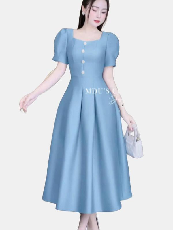 b50 váy dáng A đính cúc ngực tay bồng dáng dài