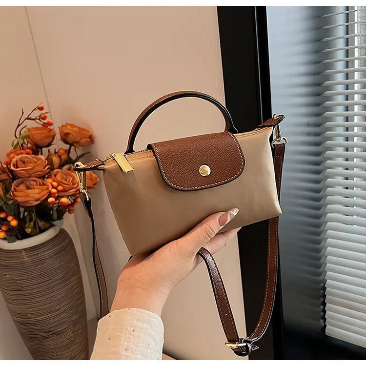 Retro Fashion Versatile Cross border Hot selling 2024 Spring/Summer Women's Bag Single Shoulder Crossbody Handheld High end Nylon Dumpling Bun