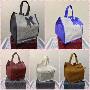 TAS HAJATAN SPUNBOND PITA EMBOS UKURAN 20 X 20.TAS HAJATAN MURAH/TAS BOX NASI/TAS BEKAL/TAS PARCEL/TAS SOUVENIR/TAS SEMBAKO/TAS BELANJA/GOODIE BAG