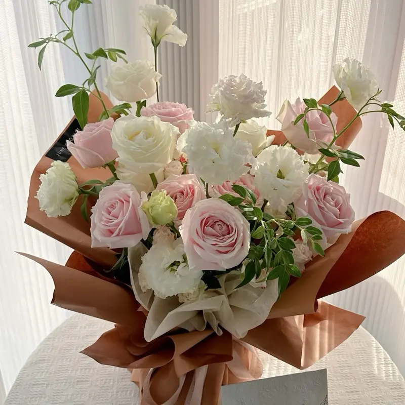 JUNE FLORIST HAND BOUQUET PINK ROSES
