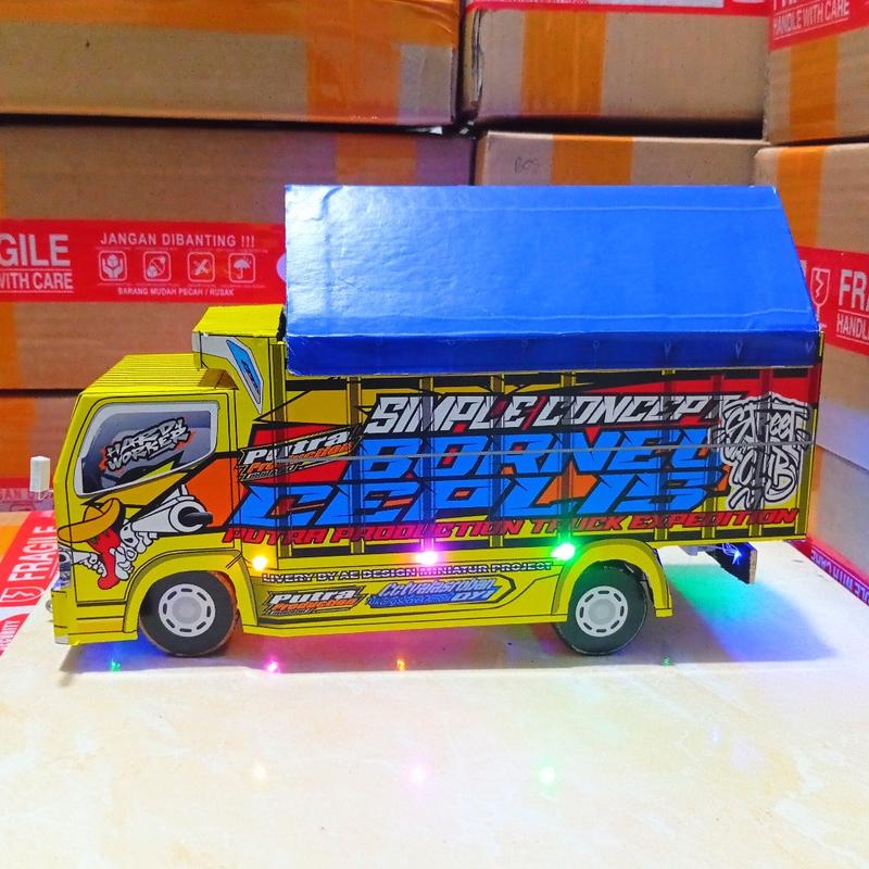 Product Introduction of MAINAN MINIATUR TRUK OLENG BISA TAMBAH NAMA DAN FOTO MINIATUR TRUK OLENG FULL VARISI LAMPU DAN TERPAL MAINAN TERLARIS 50