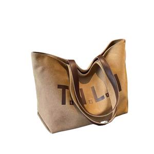 กระเป๋าผ้าใบขนาดใหญ่สำหรับผู้หญิงรุ่นใหม่ กระเป๋าสะพายข้างสบายๆ เหมาะกับทุกโอกาส กระเป๋าโททอล สำหรับนักศึกษาและใช้ในการเดินทางไปทำงาน