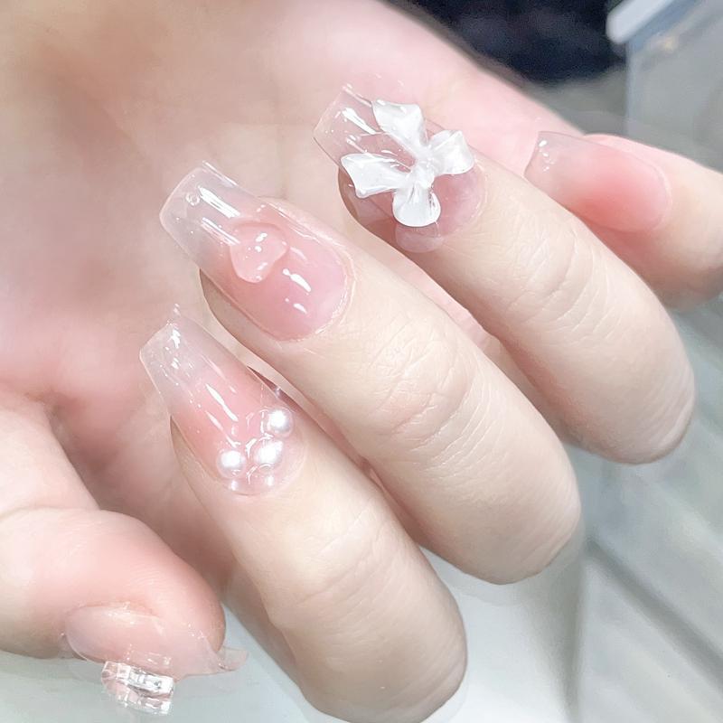 Product Introduction of Cute Pink Sweet Princess Removable Handmade Wear Nail Art Y2K Vitality Girl Short Fake Nails Blush Bow Patch Nail 3