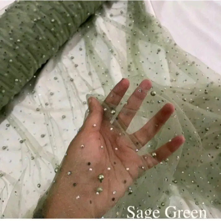 Tile mutiara zeroski Bahan kebaya dan gamis( harga per 1m )COD