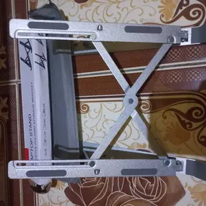 Rak laptop lipat aluminium 18 inci dengan fungsi pendinginan, dapat dilipat dan sudutnya dapat disesuaikan: cocok untuk pelajar dan pekerja jarak jauh yang bekerja dari rumah — memiliki kapasitas beban yang kuat dan dilengkapi dengan sistem pendinginan.