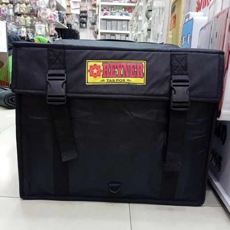 Reyner Krombong Reyner Tas Pos dengan Tali Pengaman dan Desain Tahan Lama