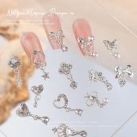 Gambar 10 Pcs Hiasan Kuku Pita Logam Silver Berlian Busur Liontin Tetesan Air Aksesoris Nail Art - Pita dari Shinycat Kota Tangerang 2 Tokopedia