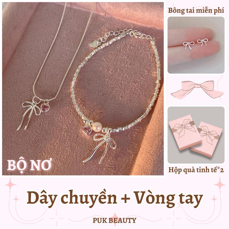 Bộ Dây Chuyền Và Vòng Tay Cho Nữ, Vòng Cổ Thiết Kế Tinh Tế Với Nơ Và Trái Tim, Ngọt Ngào Và Dễ Thương, Được Làm Bằng Vật Liệu Thép Titan Không Bị Gỉ Hoặc Phai Màu, Thích Hợp Làm Quà Sinh Nhật Cho Bé Gái, Đi Kèm Với Hộp Quà Tinh Tế, Hai Mảnh