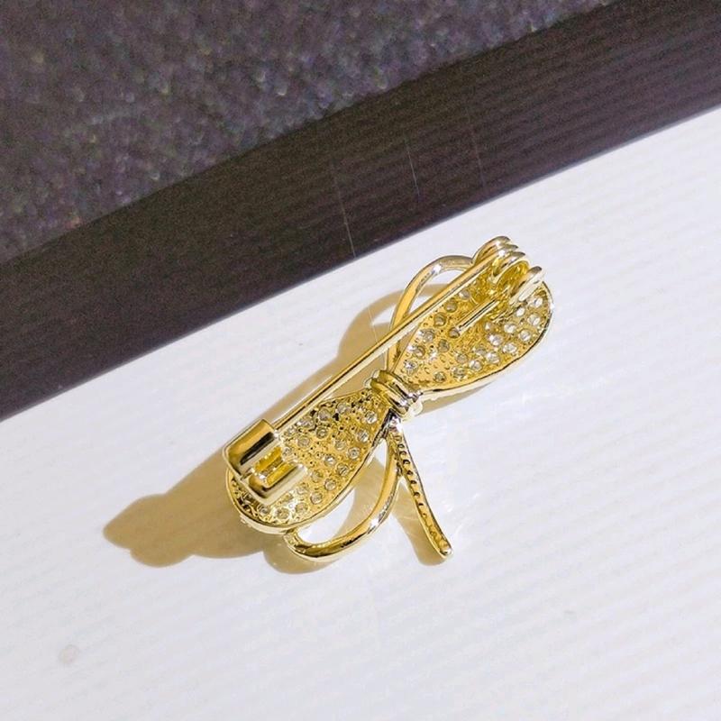 Bros Dagu Mini Pita Kecil Aloy Gold 2x1.5cm - Elegan dan Menarik 2