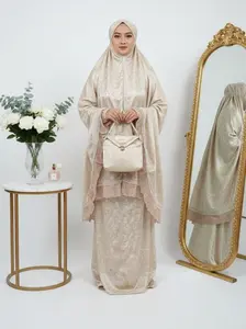 Best Seller 2 in 1 Mukena Ariny Rose Gold Motif Emboss dengan Detail Renda Eksklusif