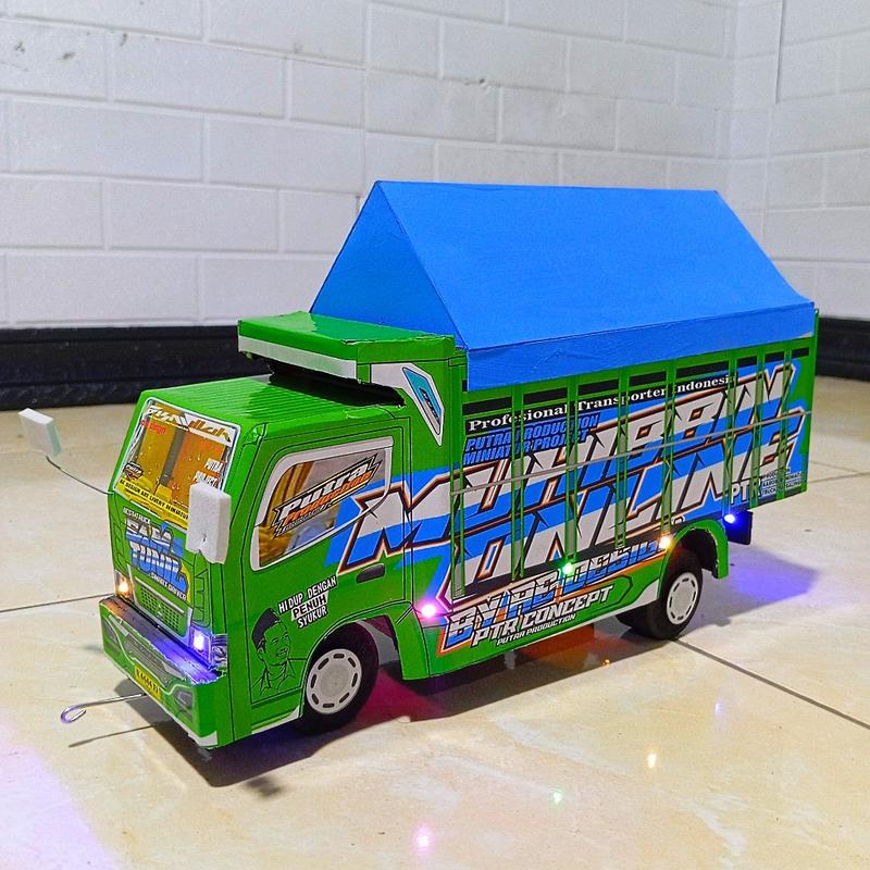 Product Introduction of MAINAN MINIATUR TRUK OLENG BISA TAMBAH NAMA DAN FOTO MINIATUR TRUK OLENG FULL VARISI LAMPU DAN TERPAL MAINAN TERLARIS 52