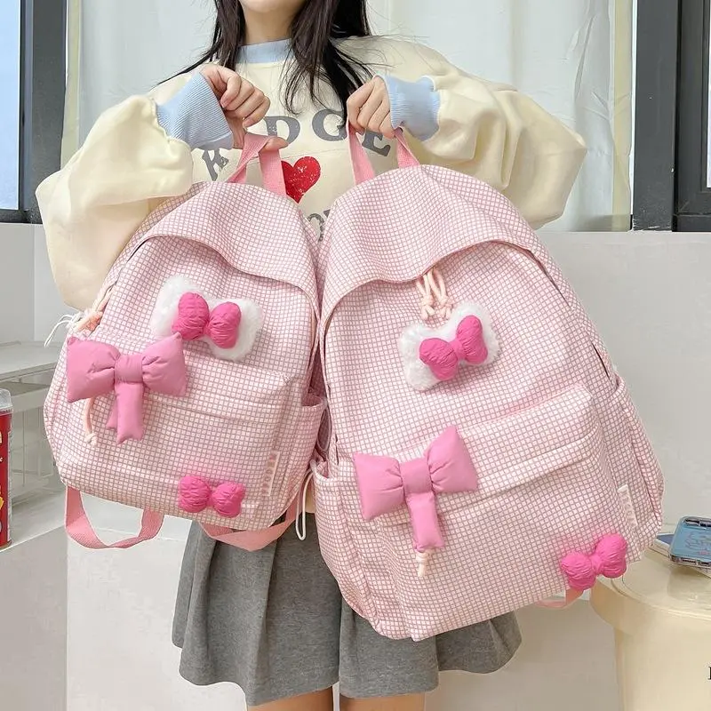 OneBear Tas Ransel Wanita Lucu Kuliah Versatile Schoolbag College Bow Bow Cute Girl Backpack SMA Kapasitas Besar LM75 Nylon Desain Unik Gaya Korea Ideal untuk Mahasiswa dan Siswa