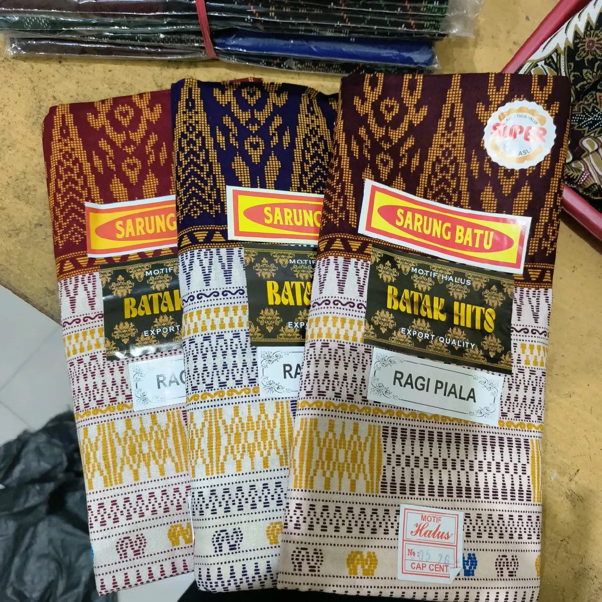 sarung katun  adem batak hits ragi piala