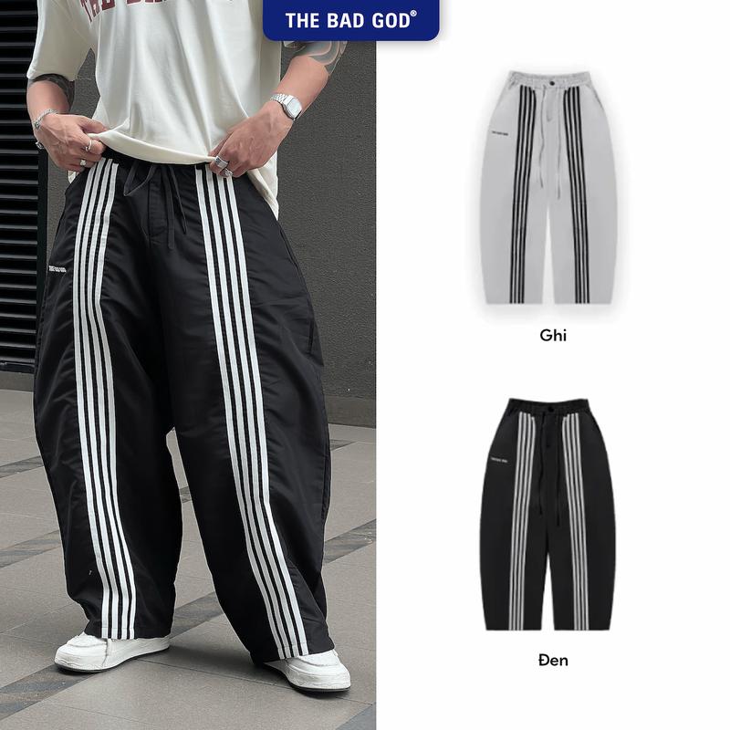 Quần Dài Nam Nữ Wide Leg Ống Rộng The Bad God Messy Chất Liệu Gió Taslan Thêu Họa Tiết Phối Kẻ Sọc - Pants Menswear