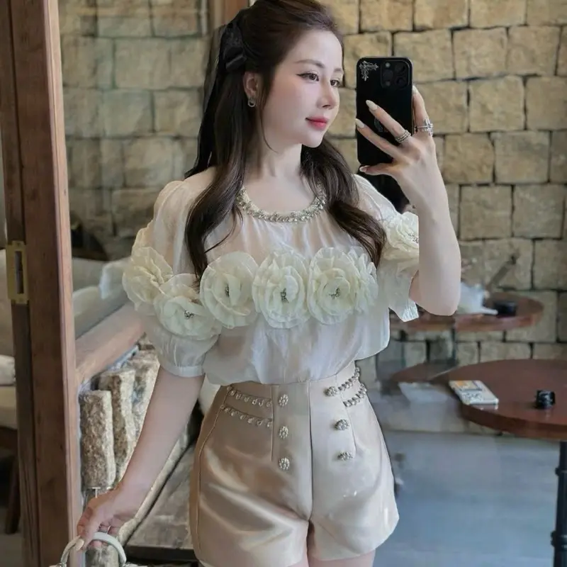 Áo tơ gấm hoa nổi QCCC sang sịn