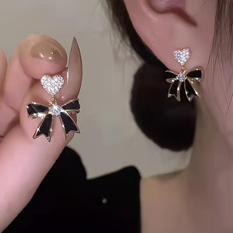 Product Introduction of Shiny Heart With Black Bow Pendant Stud Earrings Alloy Jewelry Embellished With Rhinestones Elegant Vintage Style Female Dating Earrings 1