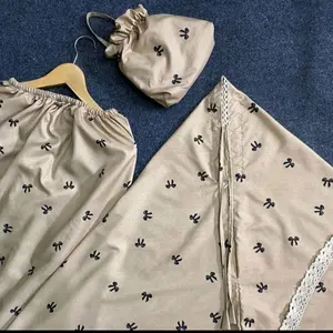 Mukena Dewasa Katun Micro Motif Pita Terlaris dengan Desain Elegan dan Nyaman untuk Penggunaan Sehari-hari