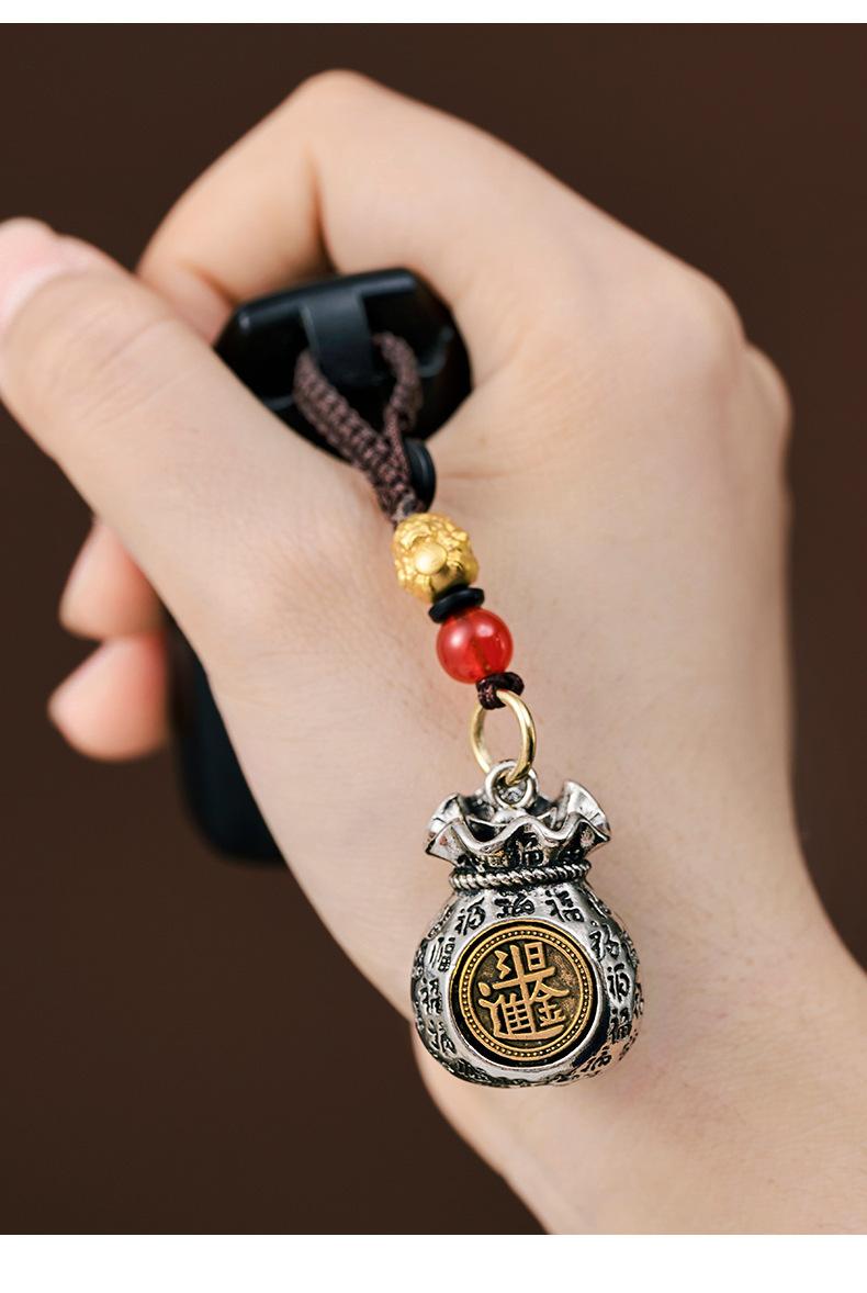Product Introduction of Feng Shui pendant Chinese Zodiac Sun Dou gold Momofu money bag can be rotated fortune bag key Car key link pendant men and women fortune 10