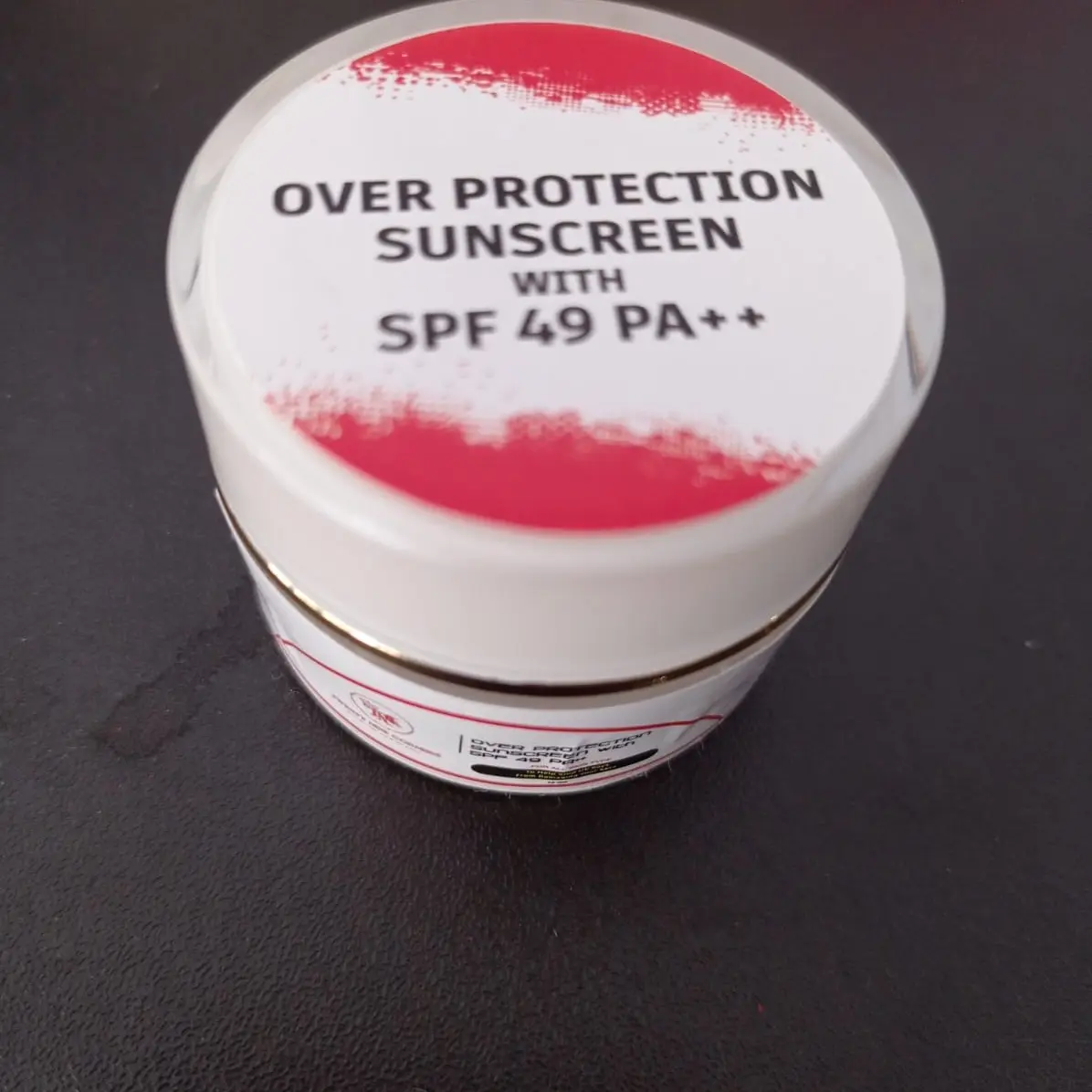 TNC OVER PROTECTION SUNSCREEN with SPF 49 PA+++ untuk semua jenis kulit