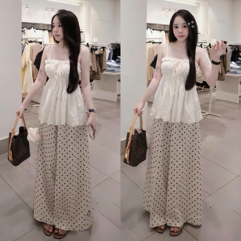 Set đồ nữ áo thiết kế 2 dây họa tiết thêu hoa đính nơ dáng xòe kèm quần dài lụa chấm bi ống rộng sang chảnh dành cho các nàng diện đi chơi.