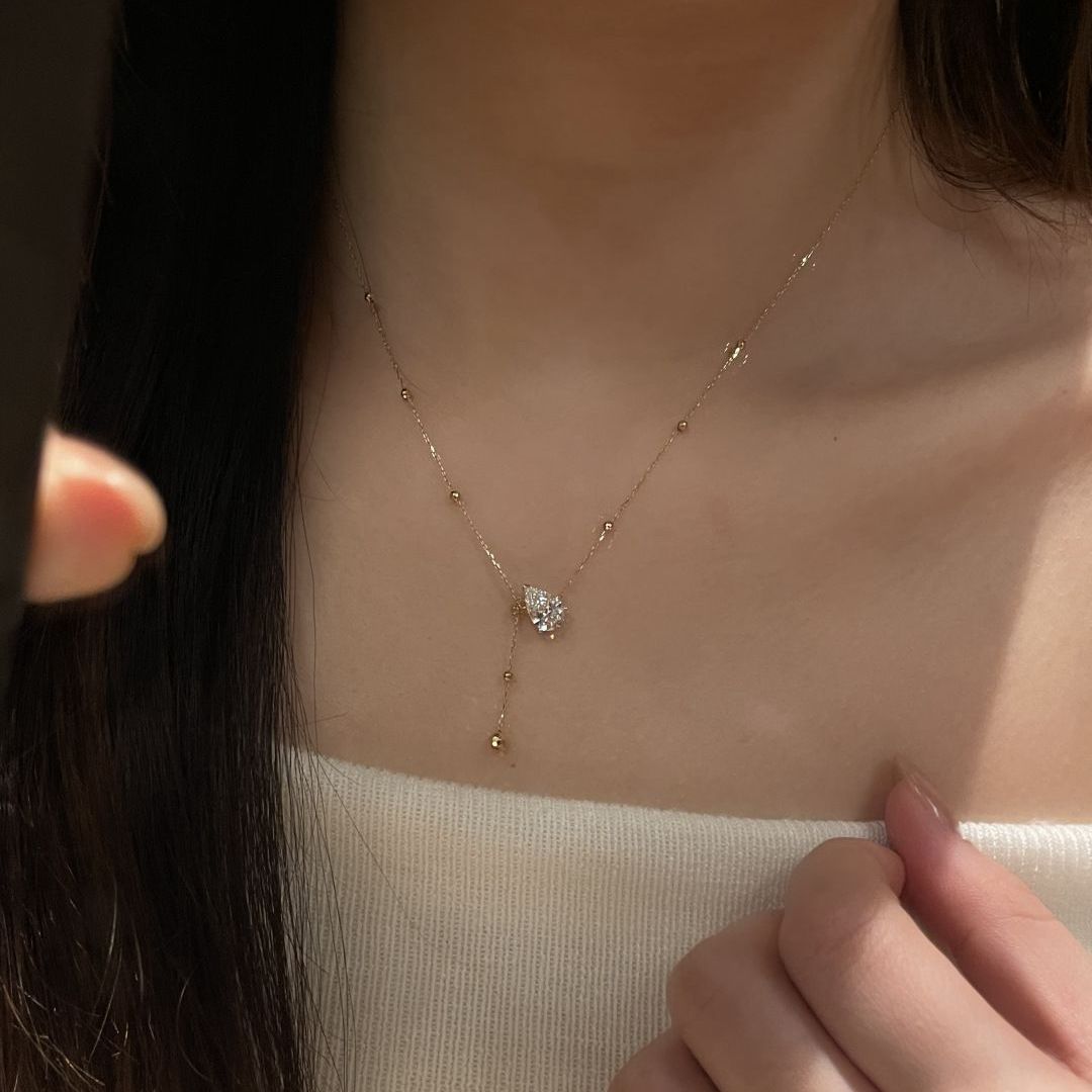 OMG! Perhiasan.Shop - Kalung Wanita Bahan Titanium Anti Karat Tetesan Cahaya Rantai Tipis Anggun Mewah dan Elegan Tahan Lama Aman untuk Sehari-hari KS066 KG066