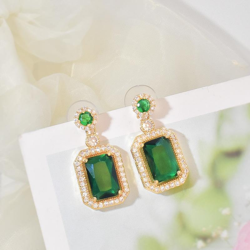 Product Introduction of Emerald Set Necklace Women's High Sense Temperament Entry Lux Fashion New Ring Ear Stud Pendant Three-Piece Set Ornament 10