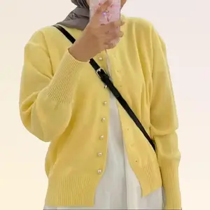 Butter Yellow Cardigan Rajut Wanita Premium Lengan Panjang dengan Detail Kancing Mutiara Elegan dan Kualitas Terbaik Bahan Rajut Nyaman Tahan Lama
