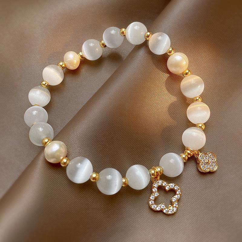 Product Introduction of Ladies' Cat Eye Stone Clover Bracelet Increases Travel Distance by 8mm 0
