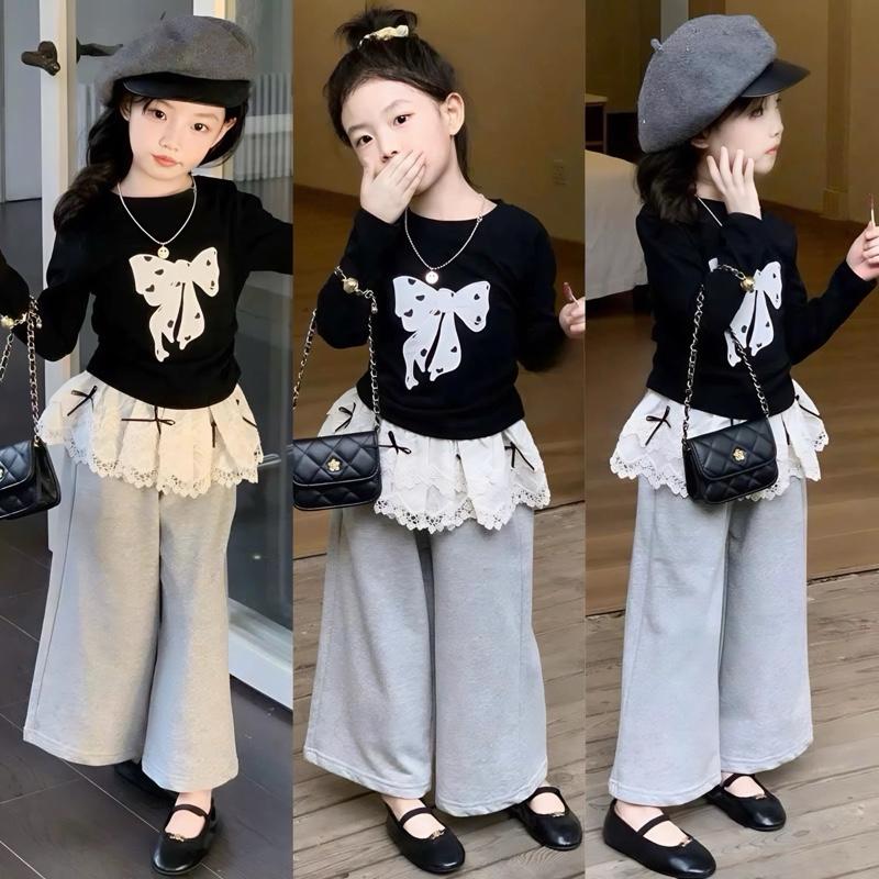 Ong Kis Sét áo đen in nơ bèo gấu ren kèm quần xuông cho bé gái 10-30kg