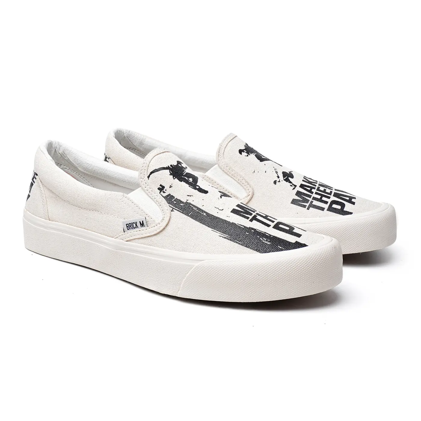 Brick Mansions - Slip On Mission Make Them Pay Off White Sepatu Sneakers Casual Pria Wanita Shoes Flat Kerja Black