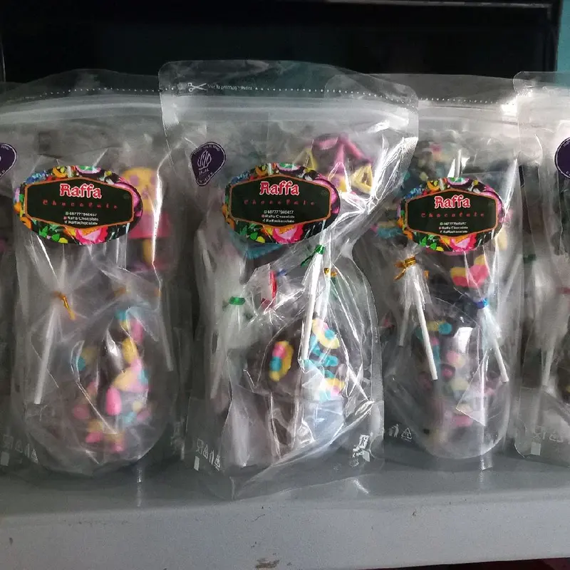 Kemasan box isi 25pcs coklat karakter permen paku 6