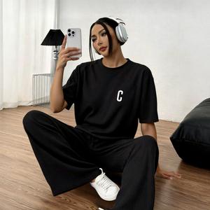 Conjunto de Dos Piezas para Mujer - Juego de Playera Holgada y Pantalones Amplios de Cintura con Cordón, Tela Suave y Fresca para un Look Cómodo-Chic en Casa o Salidas Informales, en Colores Versátiles como Negro, Blanco, Rosa Pálido y Azul Celeste