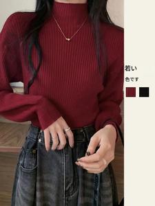 女性用スタイリッシュなタートルネックベーストップ秋冬用 ユニークな無地長袖ニットセーター