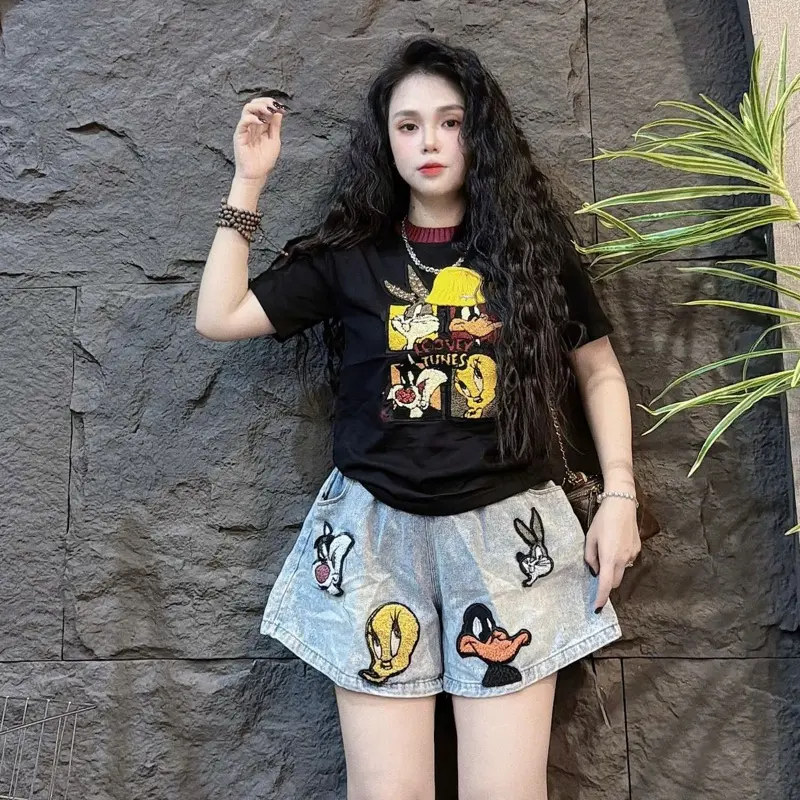 Set bộ jean đùi hoạt hình thêu long đính đá áo siêu cấp cotton tay ngắn cổ tròn quần lưng thun bản to co giản nữ