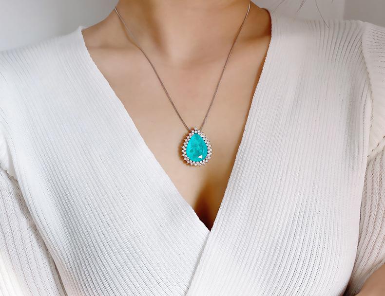 Product Introduction of Micro Inlaid Paraiba Water Drop Gem Necklace Female Ocean Heart Pendant Long Sweater Chain Female 6