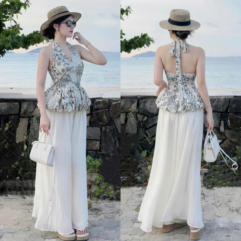 Set đồ nữ áo thiết kế cổ yếm họa tiết hoa thân sau moking kèm quần dài ống rộng sang chảnh dành cho các nàng diện đi chơi, đi tiệc