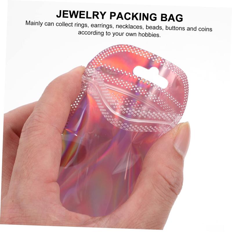 Product Introduction of FE 50 Pack Jewelry Packaging Bags Holographic Ziplock Bags for Small Business Sealable Resealable Sample Bag for Food Storage,Candy,Crafts,Jewelry 20