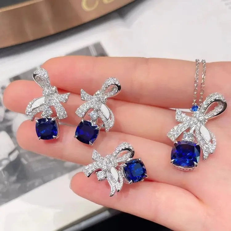 IS30B Kalung liontin kupu-kupu peri super mewah dan ringan bertatahkan cincin safir kerajaan imitasi, anting berlian biru, set batu permata berwarna untuk wanita