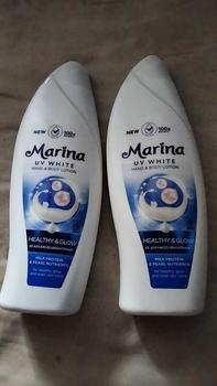 Product Review of Marina Hand Body Lotion UV White - Healthy & Glow [460 ml / 2 pcs] Exp : 09.2027 - Mencerahkan Kulit from e** 2