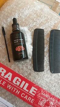 Product Review of Minyak Kemiri bakar murni Erdila penumbuh rambut 100% PURE ORIGINAL Menebalkan Menumbuhkan from S**o 0