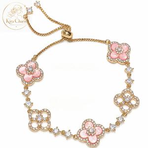 Vòng Tay Nữ Hoa 4 Cánh Màu Hồng Đính Đá Lấp Lánh, Mạ Vàng Hồng Sang Trọng, Dây Rút Điều Chỉnh Size, Chống Nước Chống Mồ Hôi Không Phai Màu