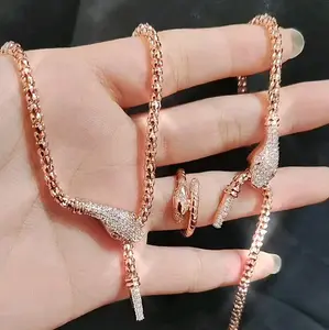 Titanium88 Set Kalung,Gelang dan Cincin MotifLUNA ULAR  Permata ZIRCONIA Wanita BRONZE Imitasi GL6