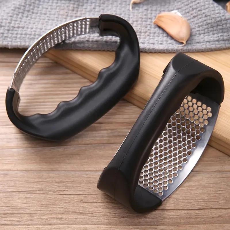 Household storage box garlic press