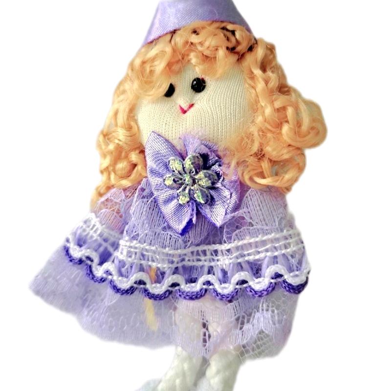 aplikasi bentuk boneka mungil warna violet 3